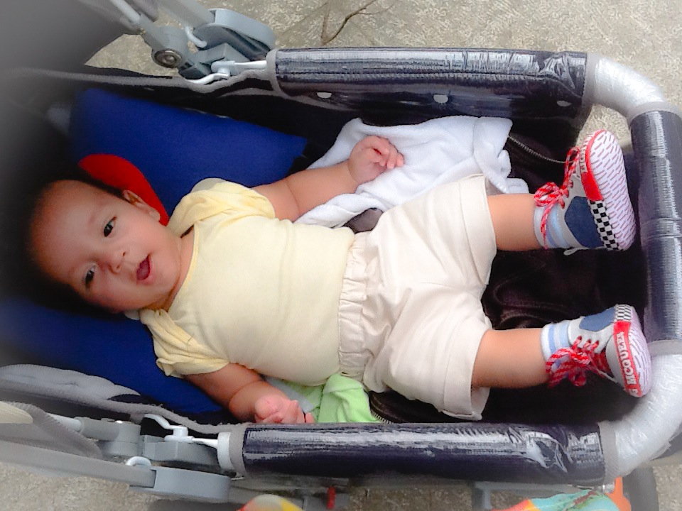 Teaching English and Living in Taiwan, pretty smiling mixed baby who love camera  image